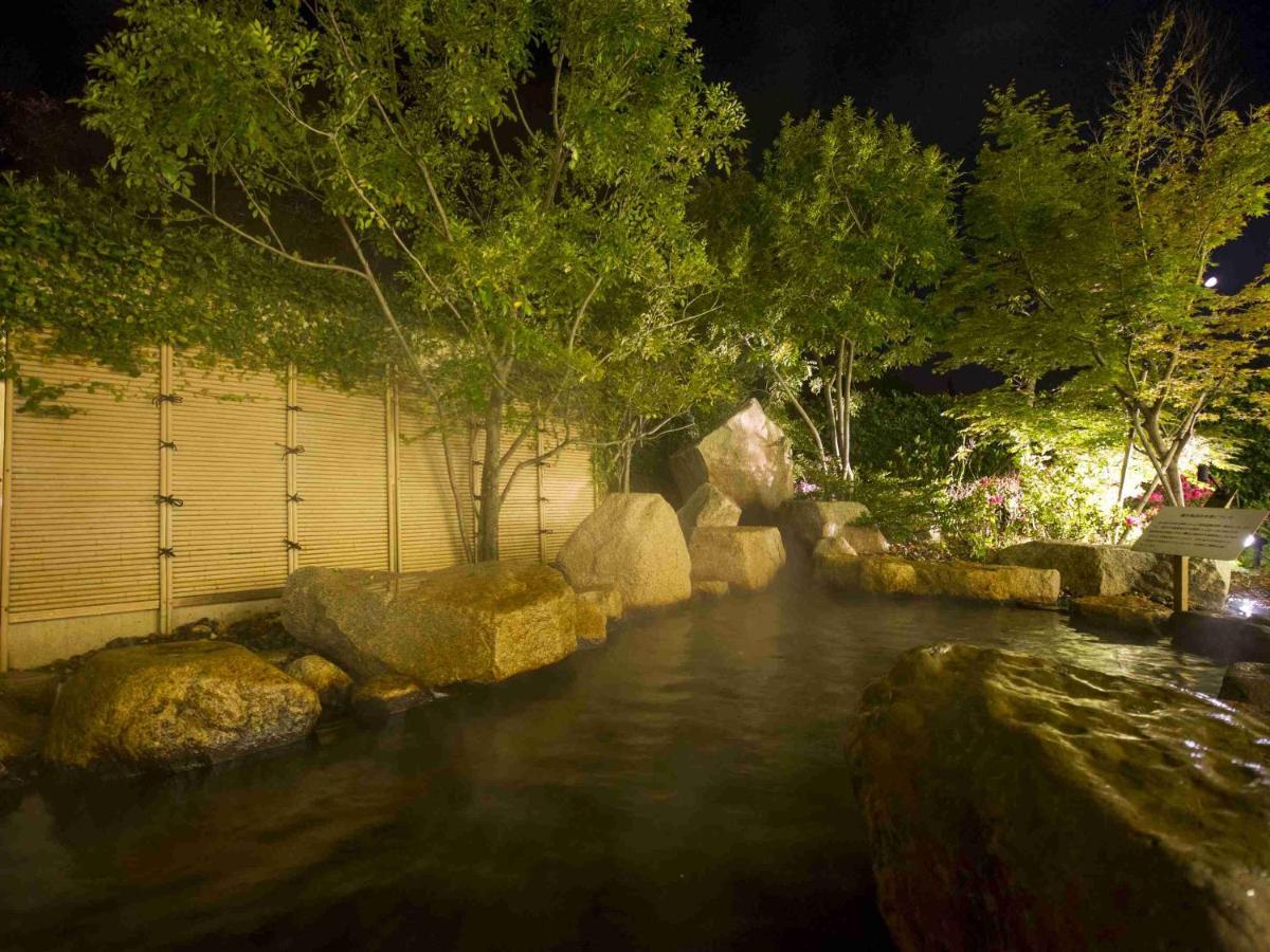 Hotel Okura Jr Huis Ten Bosch Сасебо Экстерьер фото The river at night