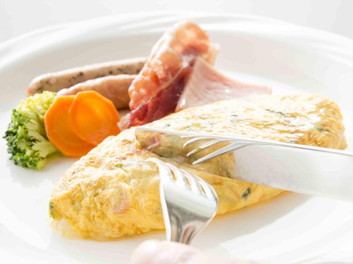 Hotel Okura Jr Huis Ten Bosch Сасебо Экстерьер фото An omelette with ham and sausages