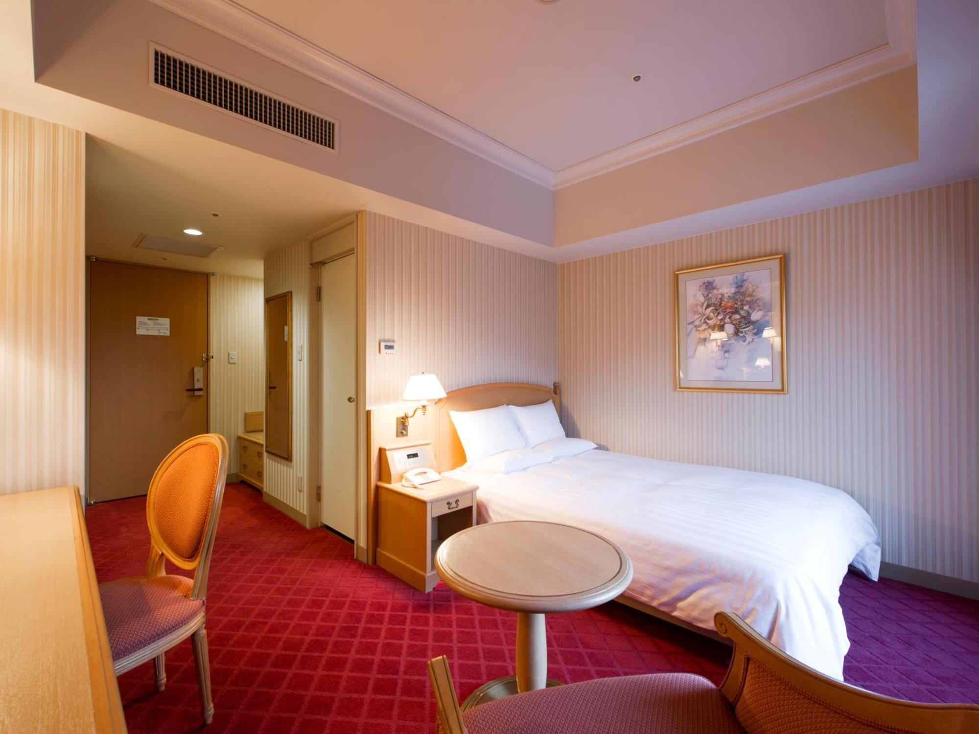 Hotel Okura Jr Huis Ten Bosch Сасебо Экстерьер фото A room at the hotel