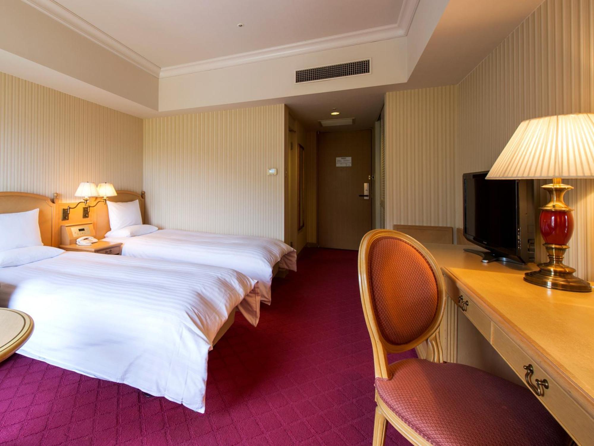 Hotel Okura Jr Huis Ten Bosch Сасебо Экстерьер фото A room at the hotel